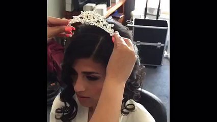 Bridal Soft Curls in a loose Bun by Kykhair