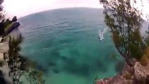 Idiot Cliff Jumper Nearly Takes Out Windsurfer