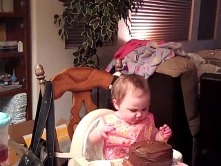 Cute baby eats his first birthday cake!