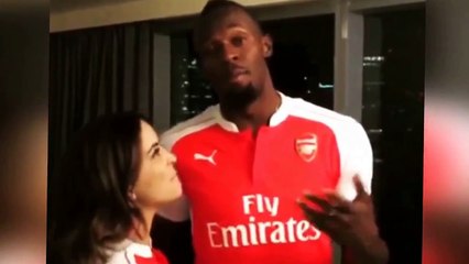 Manchester United Fan Usain Bolt Forced To Wear An Arsenal Shirt After Losing Bet