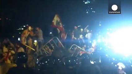 Security forces in Beirut fire tear gas and water canon on protesters