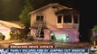 Family escapes fire by jumping out of window