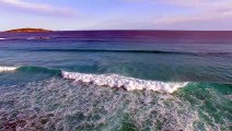 Stunning Drone Footage Of A Paddleboarder's Encounter With Two Whales