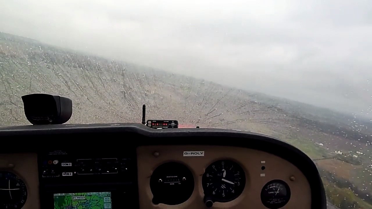 Low level bad weather crosswind landing at Netherthorpe (EGNF) on runway 24 in G-ROLY on 12 11 2012