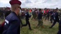 Camerawoman Blatently Trips Refugee Trying To Escape