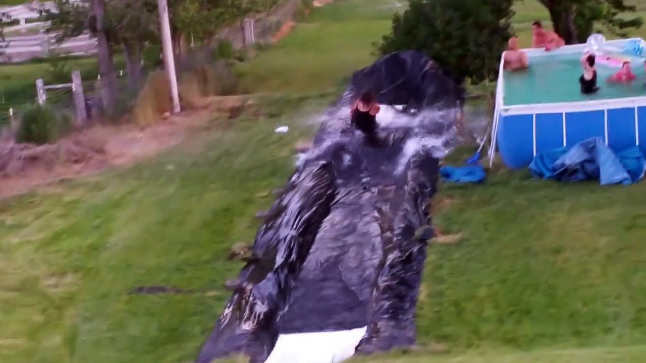 Guy Flies Off Epic Backyard Slip N Slide - Hilarious FAIL