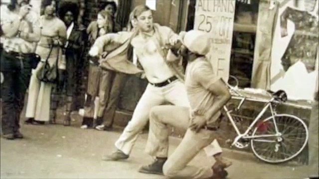 White guy knocks out HUGE black thug in street fight. Old school fight caught on tape