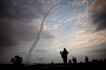 Palestinians Break Through Gaza Border Fence