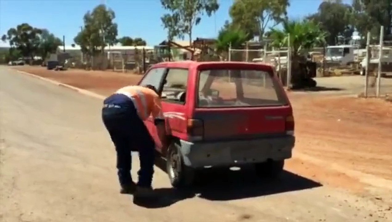 This guy can help you with your flat tire! Strong man