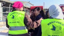 Pause tourisme à Paris pour des réfugiés