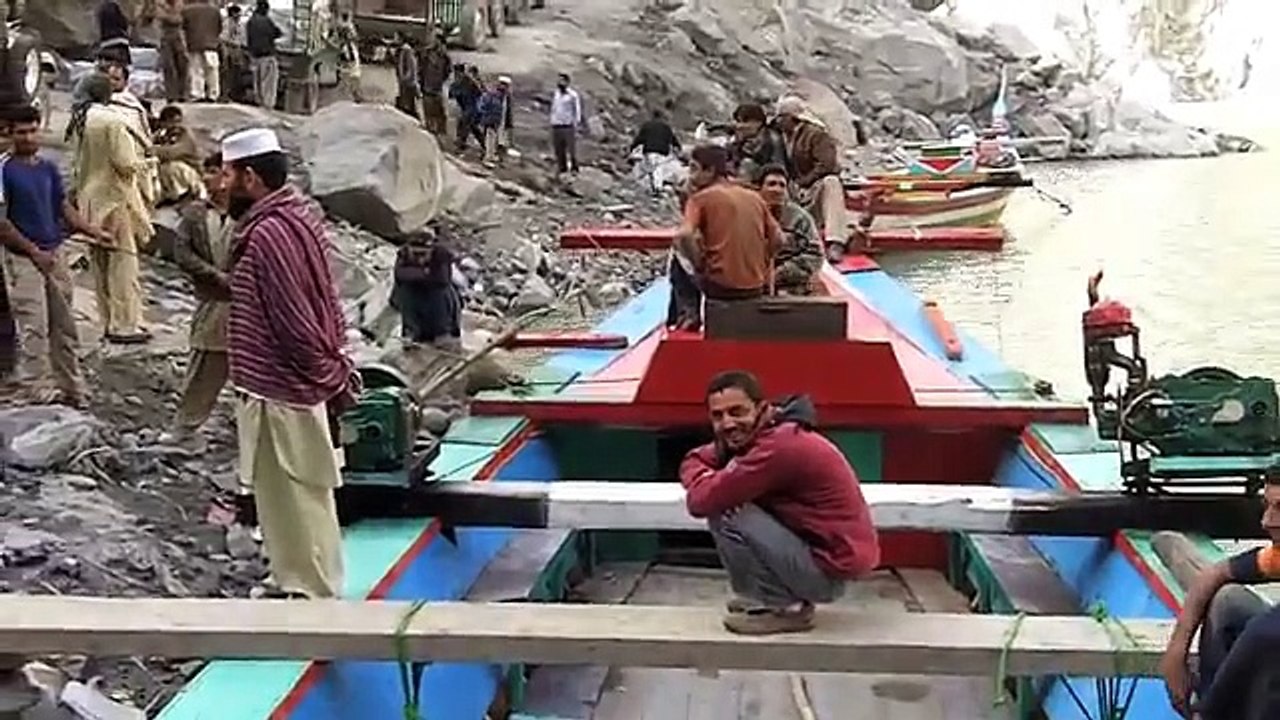 Crossing the Attabad Lake in Hunza, Pakistan. A TravelPak Trailer