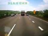 Truck pushes car down Truck And Car Crash On Highway