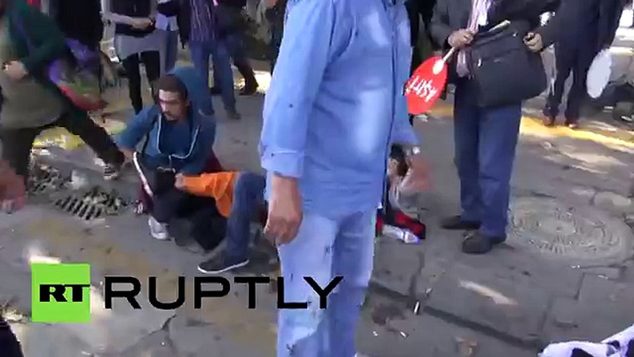 GRAPHIC- Powerful blasts rock Ankara peace rally,  dozens killed