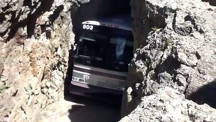 Charter Bus in Rock Tunnel