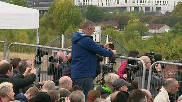 Crowds gather to watch botched tower block demolition