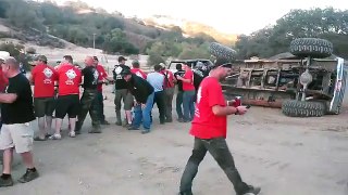 60 People Help Flip Over Flipped Truck By Pulling On Rope