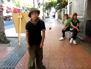 Small boy play and dance village drums - Video