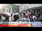 REPORTERO GRÁFICO DE NTN24 AGREDIDO POR SEGURIDAD DEL CNE