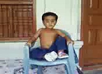 funny baby falling from chair