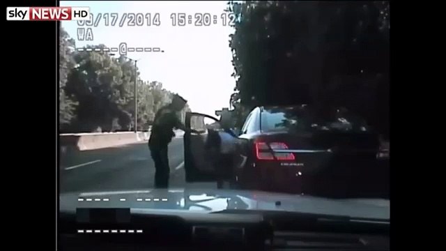 RAW VIDEO- NYPD Officer Saves Woman Choking on Candy in Highway