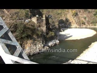 Land Cruiser crosses Marchula Bridge on the Ramganga, upstream of Corbett Park
