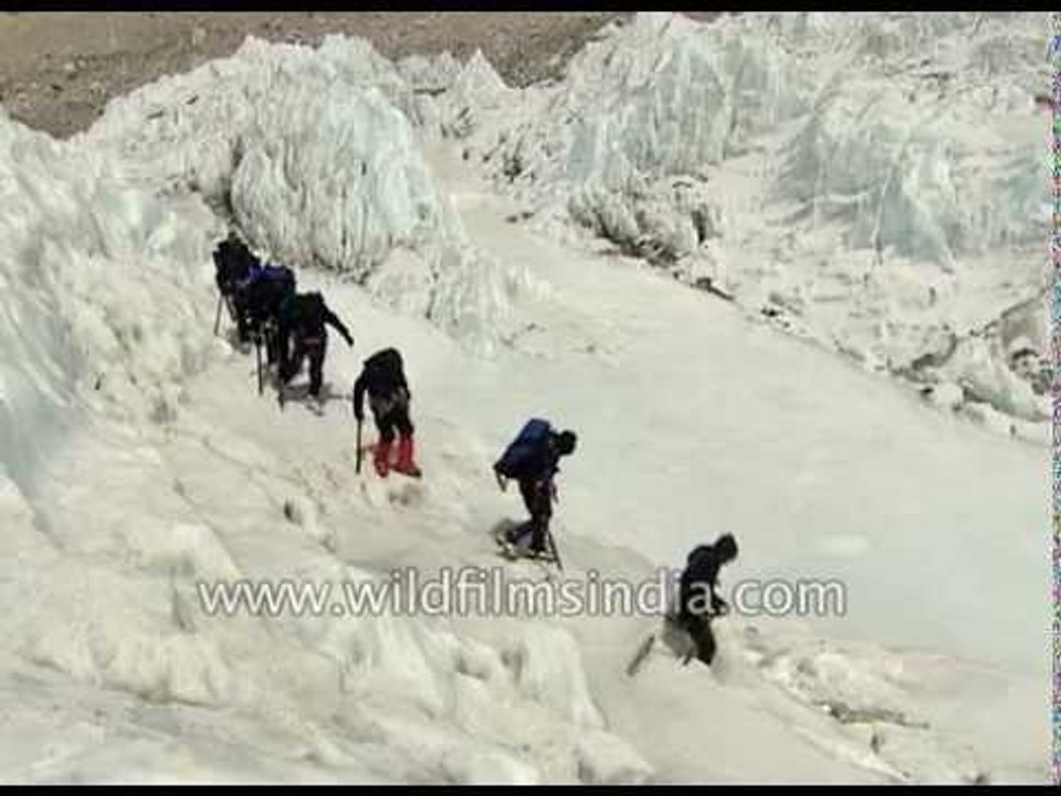 Climbers gingerly avoid crevasses in Everest glacier crossing video