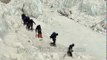 Climbers gingerly avoid crevasses in Everest glacier crossing