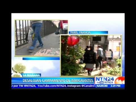Entre disturbios Policía francesa desaloja campamento de inmigrantes en París
