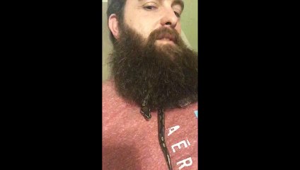 Snake Slithers Through Mans Beard