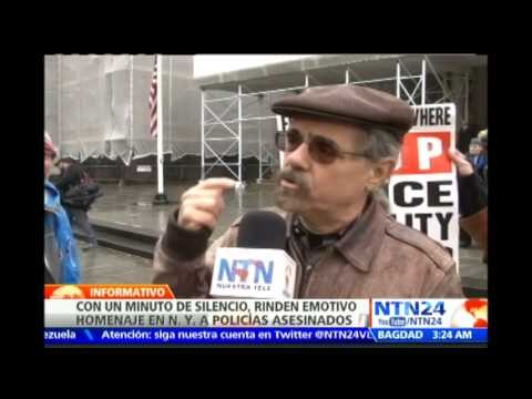 Ciudadanos rinden homenaje a los dos policías asesinados en Nueva York