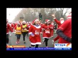 Más de seis mil personas participan en carrera en Francia disfrazadas de personajes navideños