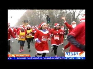 Más de seis mil personas participan en carrera en Francia disfrazadas de personajes navideños
