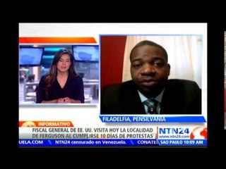 Fiscal gral. de EE.UU. llega a Ferguson para dirigir la investigación que aclare la muerte de Brown