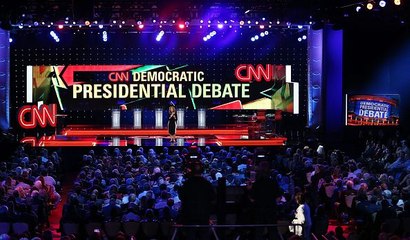 Democratic rivals back Clinton on emails, but little else in scrappy debate