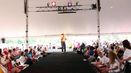 Tony Nance sings at the tent at Graceland Crossing Elvis Week 2015