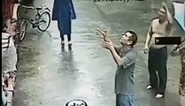 Chinese Man Catches Baby Falling from Appartment Window