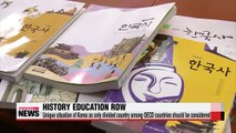 Political row over history education deepens