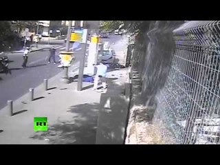 CCTV: Palestinian man rams car into bus stop, then attacks pedestrians with machete-like weapon