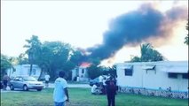 Small Plane Crashes Into Mobile Homes; 2 Catch Fire