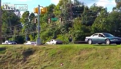 CRAZY WOMEN ON DRUGS RAMS POLICE CAR, CRASHES CAR DOWN HILL - FUNNY