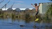 Faire du slackline au-dessus d'alligators