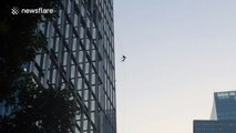US dancers perform sky ballet on skyscraper windows in Shanghai