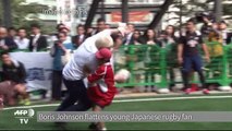 London mayor Boris flattens young Japanese rugby fan