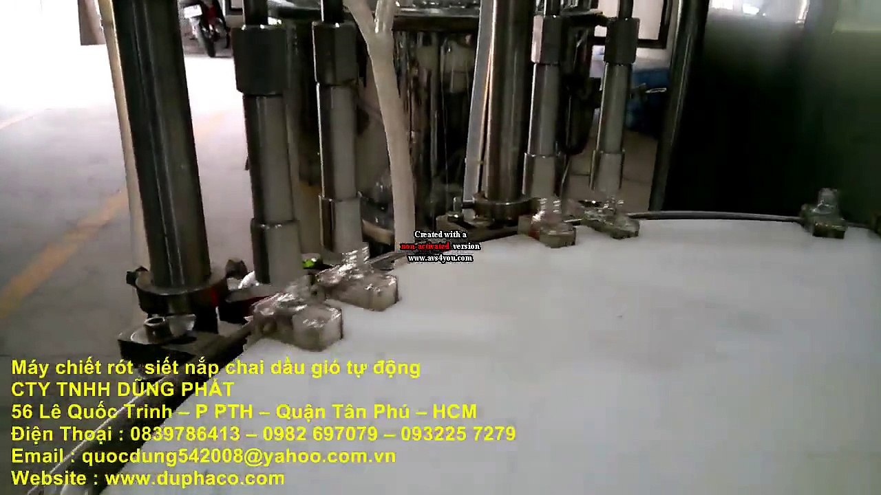 Máy chiết rót chai dầu gió xanh tự động