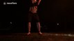 Man imitates ancient Olympics with flaming hammer throw
