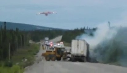 Water Bomber Cools Highway Accident! Amazing!