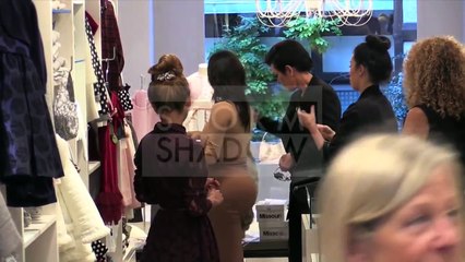 Kim Kardashian, her huge derriere and mother Kris Jenner doing shopping for North in paris