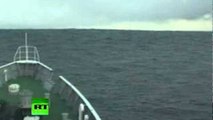 Tsunami Climbing: Incredible video of ship heading into wave in Japan