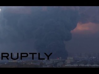 Huge blaze in St. Petersburg industrial zone, thick smoke above city sky