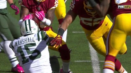 Redskins Bashaud Breeland strips the ball from Jets Brandon Marshall